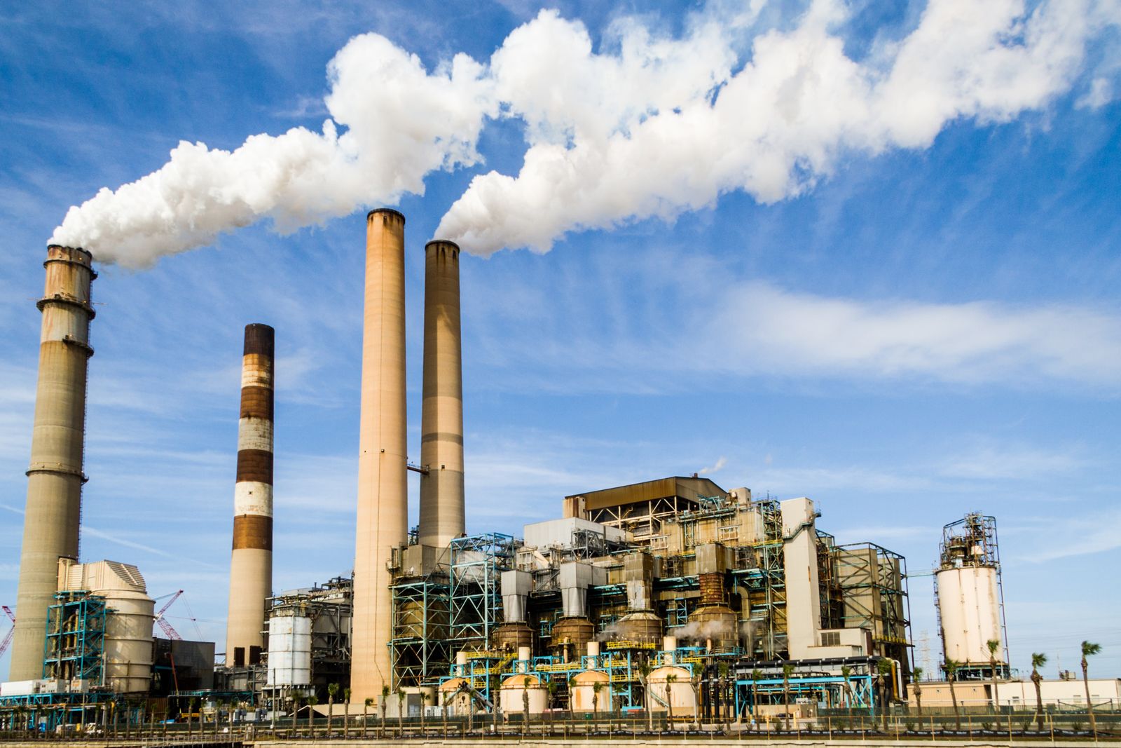 Chemical and process plant with stacks and piping